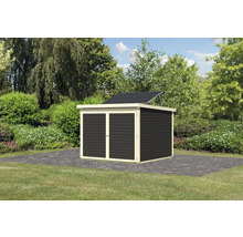 Abri de jardin avec système solaire dans le jardin