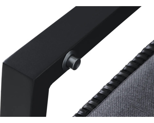 Vue détaillée d'un cadre de meuble noir avec revêtement en tissu