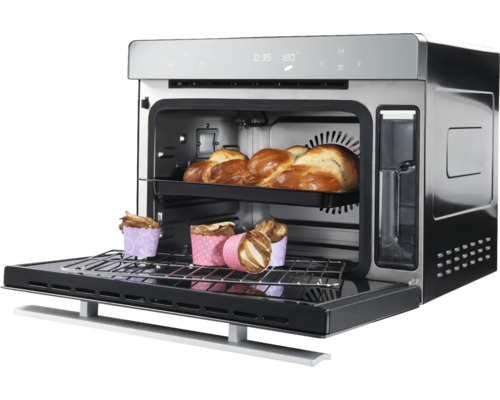 Kombigerät mit Brot und Muffins im Innenraum