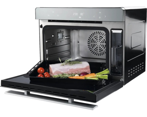 Backofen mit Speisen im Garraum für die Zubereitung