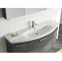 Moderner Badezimmer-Waschtisch mit weissem Mineralguss-Becken und dunklem Unterschrank mit Holzstruktur und Metallgriffen.