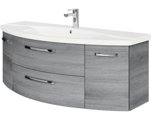 Waschtischunterschrank mit Waschbecken und Armatur, geschwungene Front, Holzoptik Grau, Chromgriffe.