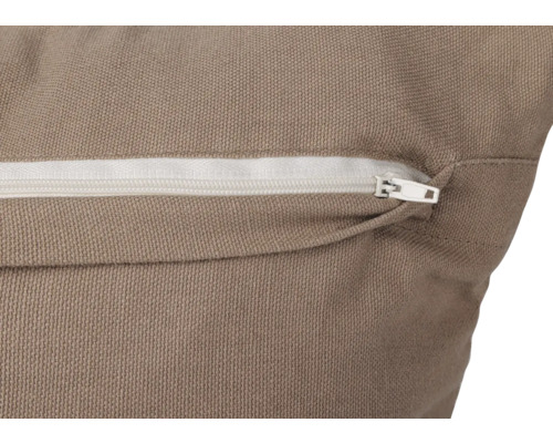 Gros plan d''un coussin avec fermeture éclair