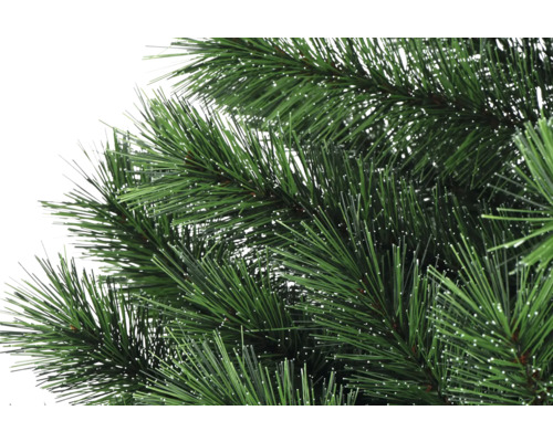Gros plan d''un arbre de Noël artificiel avec des aiguilles vertes