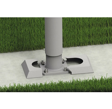 Fixation de mât d''éclairage avec recouvrement sur sol en béton