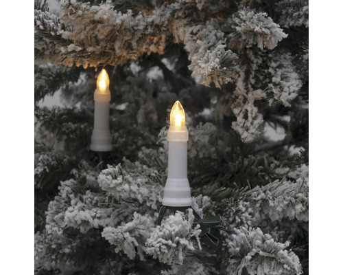 Arbre de Noël avec guirlande lumineuse bougies