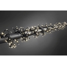Guirlande lumineuse avec LED blanc chaud enroulée autour d''un tube.