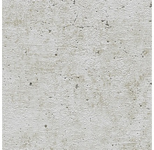 Gros plan d''un mur en béton avec une surface rugueuse.