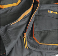 Détail d'un gilet de travail avec fermeture éclair et poches