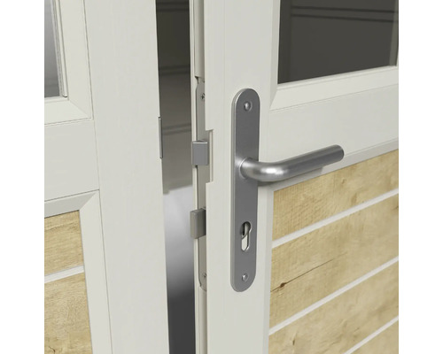 Gros plan d'une porte blanche avec une poignée de porte argentée et un trou de serrure