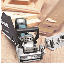 Fraiseuse à rainures Makita avec sac à poussière sur une surface en bois