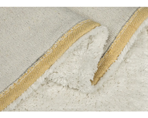 Nahaufnahme einer Kuscheldecke mit Bordüre