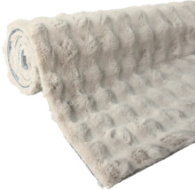 Aufgerollter Teppich mit weicher Oberfläche