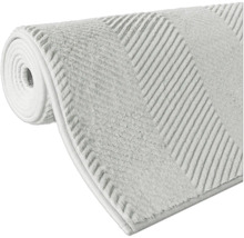 Tapis de bain enroulé avec motif rayé