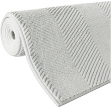Tapis de bain enroulé avec motif rayé