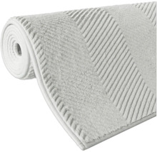 Tapis de bain enroulé avec motif rayé