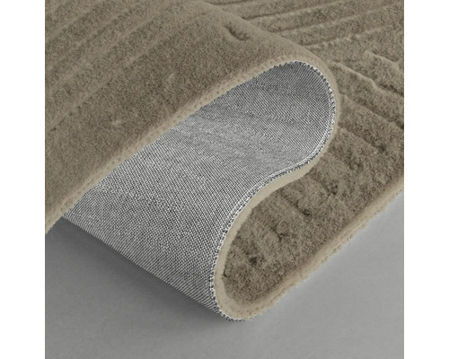 Tapis avec structure en relief et envers tissé