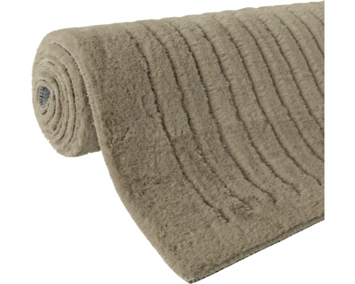 Passage de tapis roulé avec surface côtelée