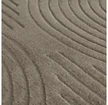 Vue détaillée d'un tapis avec motif en relief