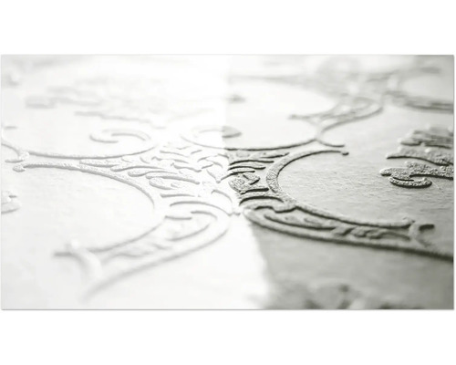 Gros plan d'un papier peint en vinyle texturé avec motif floral