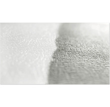 Gros plan d'une surface en verre texturée