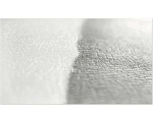 Gros plan d'une surface en verre texturée