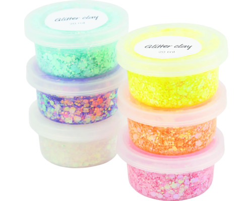 Stapel aus Glitzerknete in verschiedenen Behältern