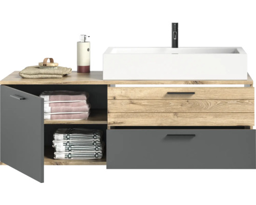 Meuble sous-lavabo avec lavabo, robinet, serviettes et accessoires de salle de bain pour salle de bain