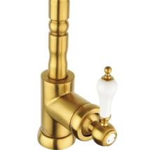 Goldfarbene Waschtischarmatur mit weißem Griff