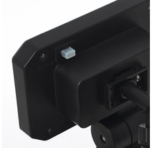 Vue détaillée d'un luminaire extérieur noir avec détecteur de mouvement.