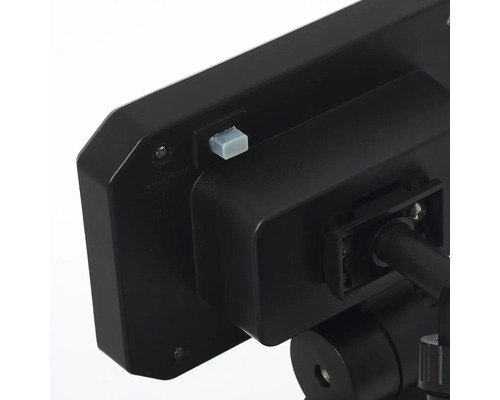 Vue détaillée d'un luminaire extérieur noir avec détecteur de mouvement.