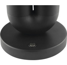 Detailaufnahme einer schwarzen Leuchtenhalterung mit Schalter