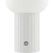 Tischleuchte mit geripptem Sockel und rundem Schirm