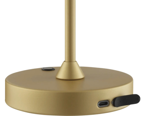 Detailaufnahme des Sockels einer Tischleuchte mit USB-Anschluss.