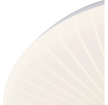 Détail d'une lampe ronde avec surface côtelée