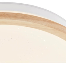 Gros plan d'un plafonnier avec décor en bois