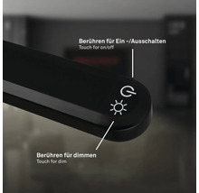 Nahaufnahme der Touch-Bedienelemente einer Lampe zum Ein- und Ausschalten sowie zum Dimmen.