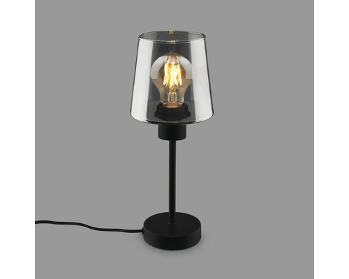 Tischleuchte mit transparentem Glasschirm und schwarzem Sockel