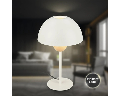 Weisse Tischleuchte für indirekte Beleuchtung in einem Schlafzimmer
