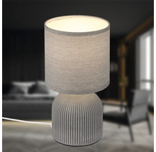 Tischleuchte mit Stoffschirm und geripptem Keramikfuß