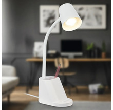Weisse Schreibtischlampe mit Stifthalter auf einem Schreibtisch