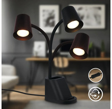 Schreibtischleuchte mit drei Leuchtenarmen und integrierter Aufbewahrung