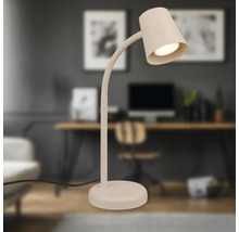 Tischleuchte mit flexiblem Arm auf einem Schreibtisch