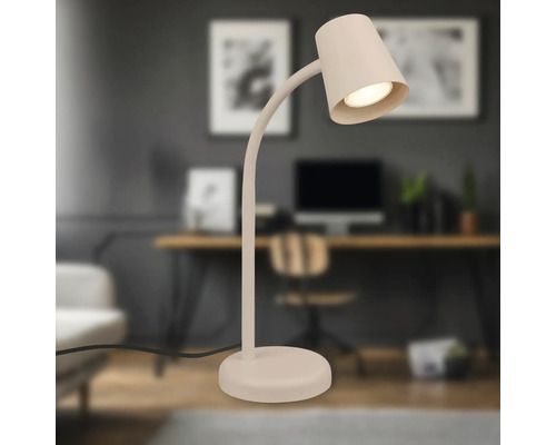 Tischleuchte mit flexiblem Arm auf einem Schreibtisch