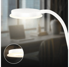 Weisse Tischleuchte mit flexibler Halterung auf einem Schreibtisch