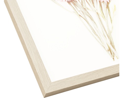 Detailaufnahme eines Bilderrahmens mit Blumenmotiv