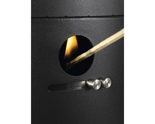 Allumage d'un poêle avec une allumette