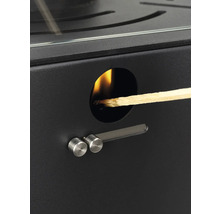 Allumer un poêle avec une allumette