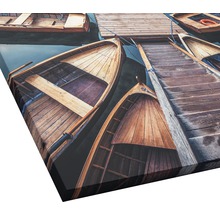 Tableau sur toile avec des bateaux en bois sur un quai