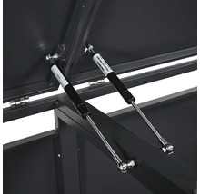 Vue détaillée des ressorts à gaz d'un coffre de jardin